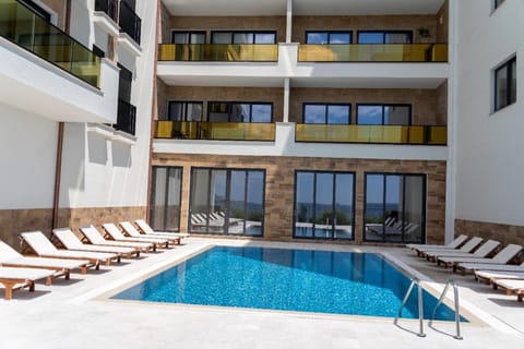 Property building, Swimming pool, Swimming pool, sunbed
