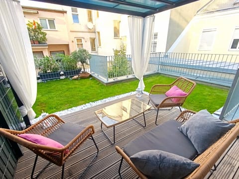 Property building, Day, Garden, Garden, View (from property/room), Balcony/Terrace, Decorative detail, Decorative detail, Seating area, Garden view, sunbed, sunbed
