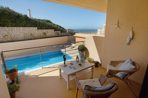 Property building, Living room, Swimming pool