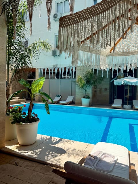 Patio, Day, Pool view, Swimming pool, sunbed
