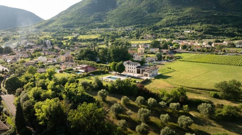 Property building, Natural landscape, Bird's eye view, Mountain view, Swimming pool