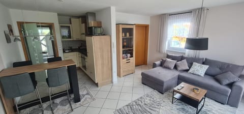 Kitchen or kitchenette, Living room, Seating area, Dining area