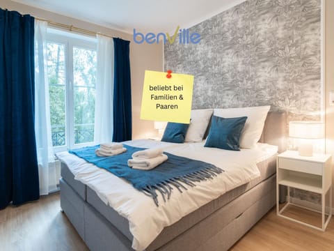 Bed, Photo of the whole room, Bedroom, Text overlay, towels