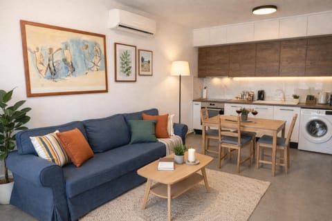 Kitchen or kitchenette, Seating area, stove, washing machine