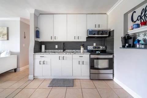 Kitchen or kitchenette, oven, stove