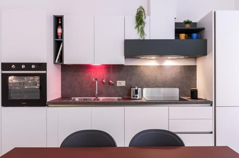 Kitchen or kitchenette, oven, stove