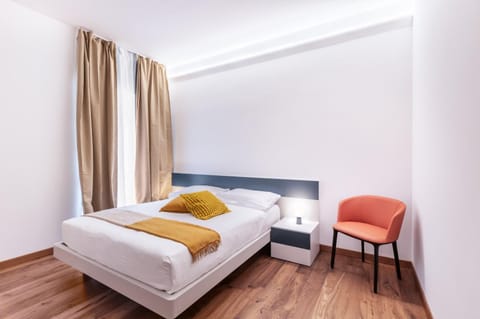 Bed, Seating area, Bedroom