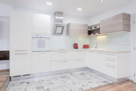 Kitchen or kitchenette, oven, stove