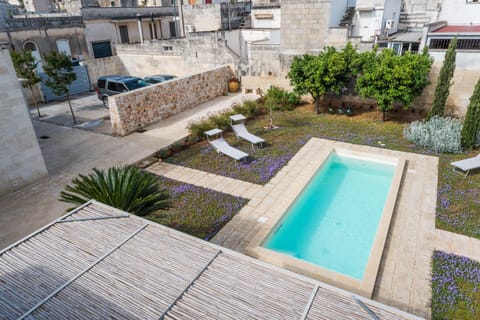 Patio, Day, Garden, Pool view, Swimming pool, sunbed