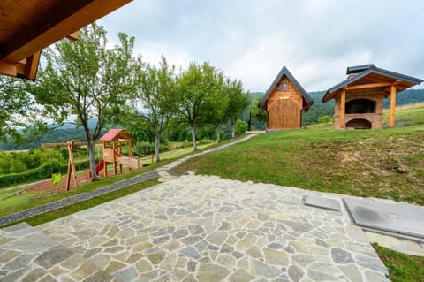 Property building, Spring, Day, Natural landscape, Children play ground, Garden, View (from property/room), Balcony/Terrace, Garden view
