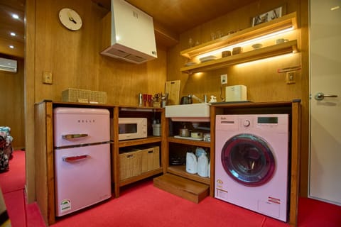 Kitchen or kitchenette, washing machine