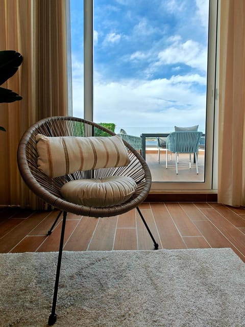 View (from property/room), Living room, Seating area, Sea view