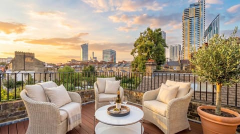 Property building, Patio, Day, Natural landscape, View (from property/room), Balcony/Terrace, Seating area, City view
