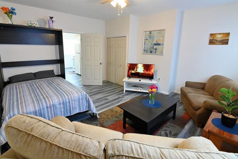 Bed, Living room, Seating area