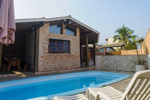Property building, Patio, Day, Pool view, Swimming pool