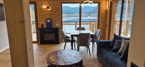 Living room, Dining area, Lake view, Mountain view, fireplace