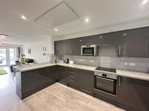 Kitchen or kitchenette, oven, stove, toaster