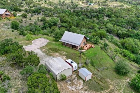 RUSTIC ARMADILLO CABIN with VIEW BY HIDDEN FALL PARK, Fenced yard for Dogs Cabin in Lake Travis