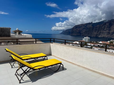 Patio, Nearby landmark, Natural landscape, View (from property/room), Seating area, Mountain view, Sea view, sunbed