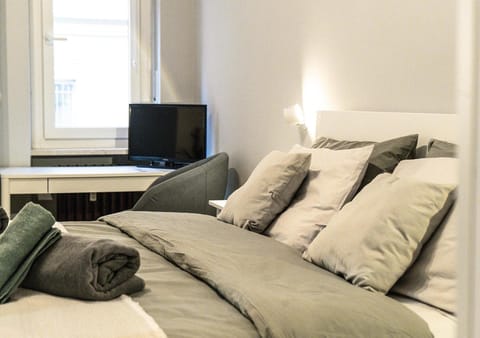Bed, Living room, Seating area, Bedroom
