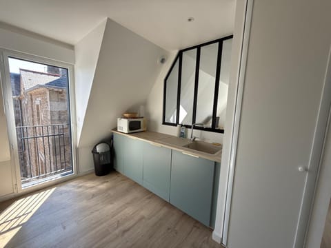 Kitchen or kitchenette, microwave