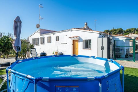 Property building, Living room, Swimming pool