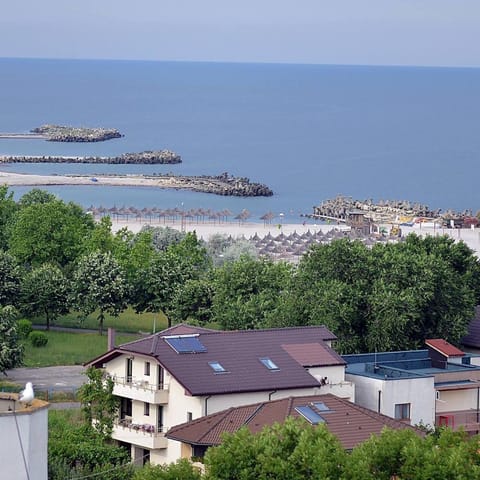 Property building, Day, Natural landscape, Beach, Sea view