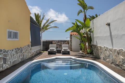 Property building, Living room, Swimming pool