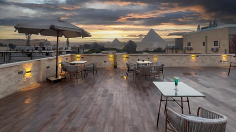 Nearby landmark, Restaurant/places to eat, View (from property/room), Balcony/Terrace, Balcony/Terrace, Sunset, sunbed