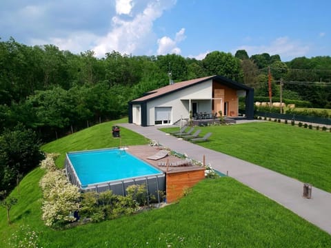 Property building, Day, Natural landscape, Solarium, View (from property/room), Garden view, Swimming pool, sunbed