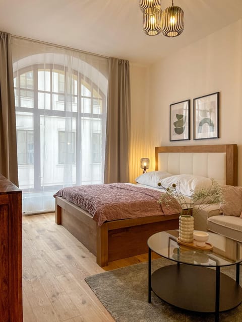 Bed, Living room, Seating area, Bedroom