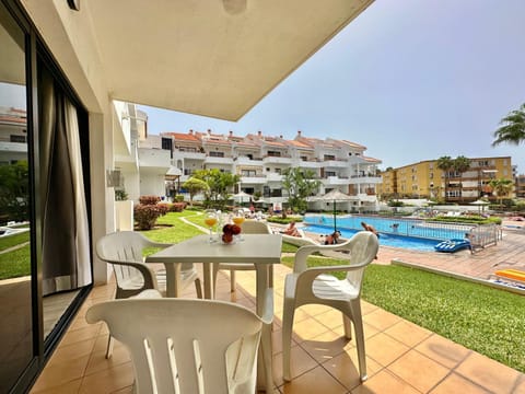 Property building, Balcony/Terrace, Dining area, Pool view, Swimming pool