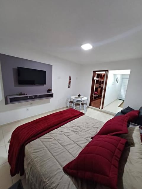 Communal lounge/ TV room, Bed, TV and multimedia, Living room, Photo of the whole room, Seating area, Bedroom