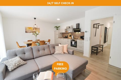 Kitchen or kitchenette, Living room, Photo of the whole room, Seating area, Dining area, Text overlay, oven