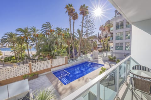 Property building, Living room, Swimming pool