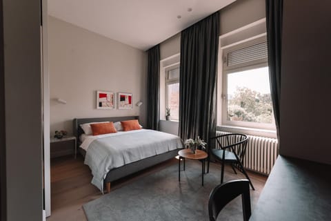 Bed, Seating area, Bedroom