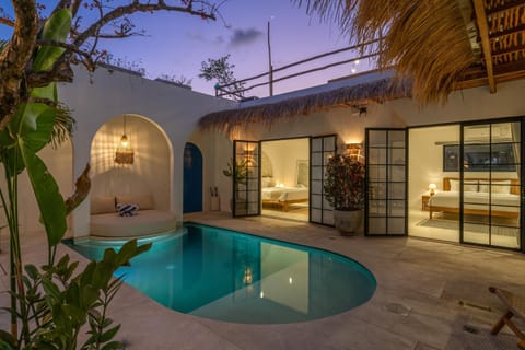 Property building, Patio, Night, Pool view, Swimming pool, sunbed