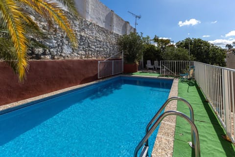 Property building, Living room, Swimming pool