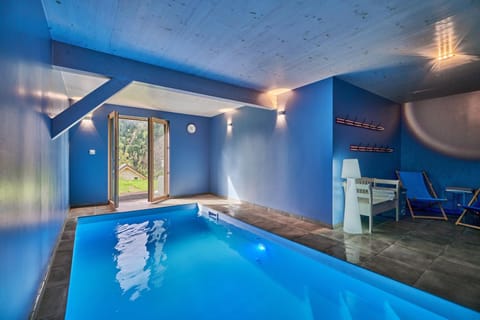 Property building, Living room, Swimming pool