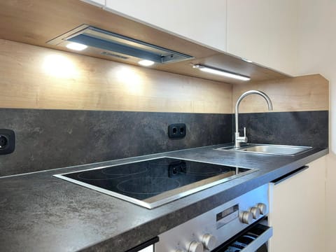 Kitchen or kitchenette, stove