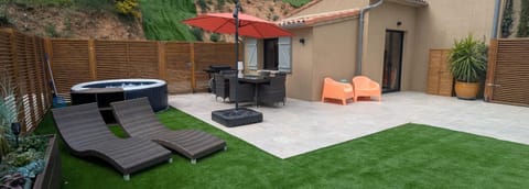 Property building, BBQ facilities, sunbed