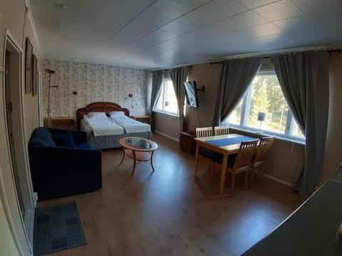 Bed, Seating area, Dining area, Bedroom