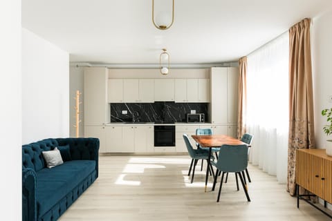 Kitchen or kitchenette, Living room, Seating area, Dining area
