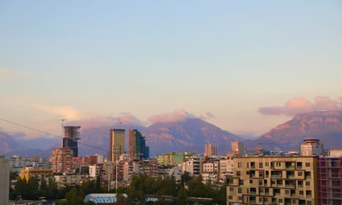 Property building, Nearby landmark, Day, Natural landscape, City view, Mountain view