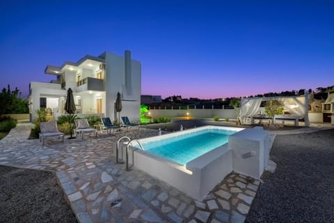 Property building, Patio, Night, Natural landscape, Swimming pool, sunbed