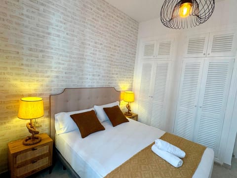 Bed, Photo of the whole room, Bedroom, towels, wardrobe