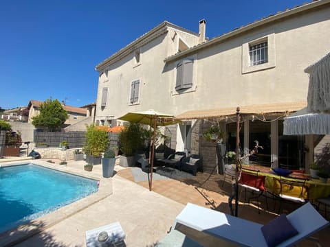 Property building, Patio, Facade/entrance, Garden, Garden view, Pool view, Swimming pool, sunbed