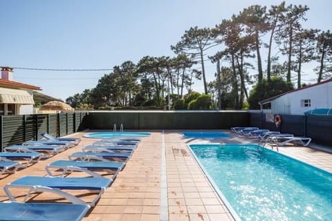 Property building, Living room, Swimming pool