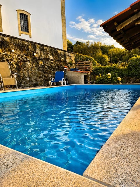 Property building, Living room, Swimming pool