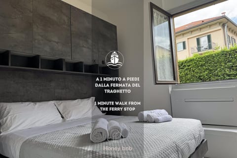 Bed, Photo of the whole room, Bedroom, Text overlay, towels